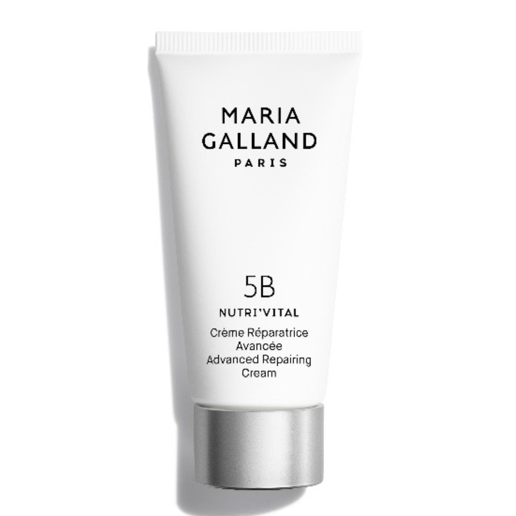 Eine weiße Tube Maria Galland Nutri'Vital 5B Advanced Repairing Cream mit einer silbernen Kappe steht aufrecht vor einem weißen Hintergrund.