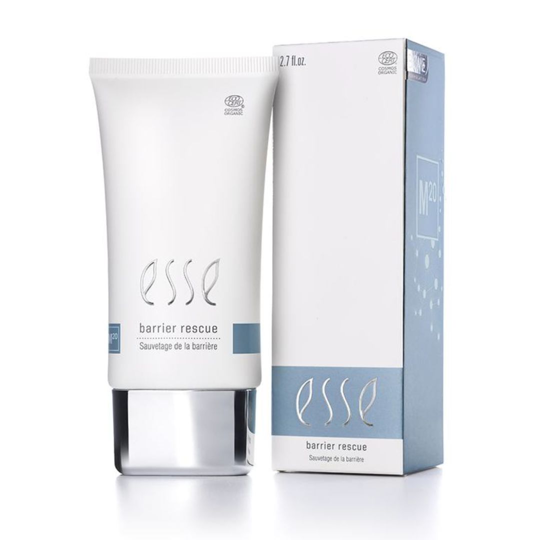 Eine Tube ESSE Skincare Barrier Rescue-Creme neben der aufrecht stehenden Produktverpackung, die zur Stärkung der Hautbarriere entwickelt wurde.
