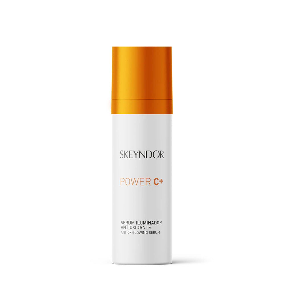 Eine weiße Flasche Skeyndor POWER C+ ANTIOX GLOWING SERUM 12,5% mit orangefarbenem Verschluss und minimalistischem Fronttext.