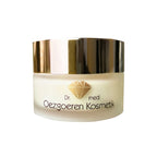 Ein weißer Tiegel mit einem goldglänzenden Deckel, beschriftet mit "Dr. med. Oezgoeren Kosmetik - Beautify your Skin Anti Aging Creme" von No.1 Cosmetics, zeigt ein goldenes Diamantsymbol und enthält eine Hautpflegecreme.