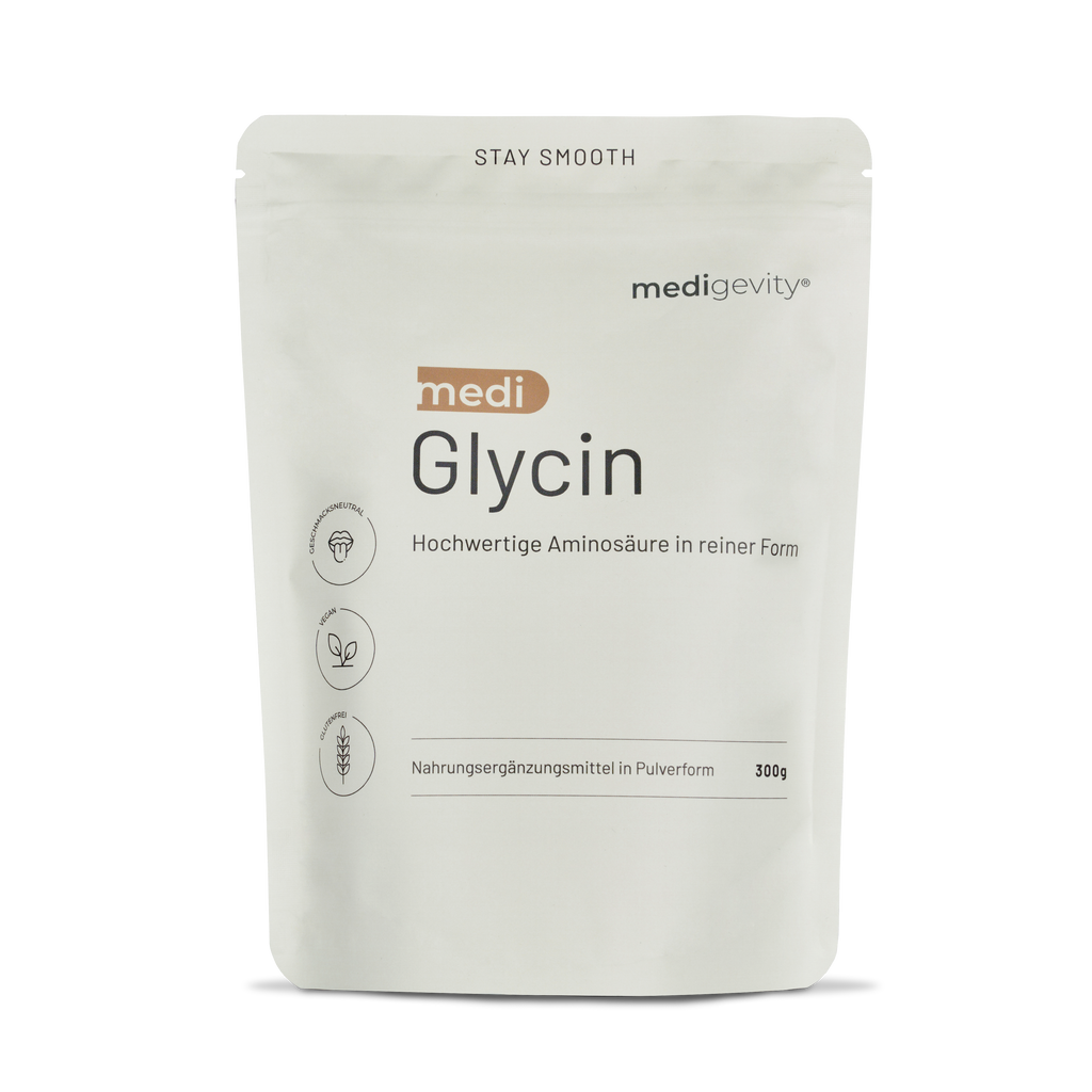 Ein weißer, wiederverschließbarer Beutel mit der Aufschrift "medigevity - medi Glycin Pulver" von medigevity, mit Pflanzen- und Weizensymbolen, enthält laut deutschem Text 300 g reines Glycin-Aminosäurepulver.